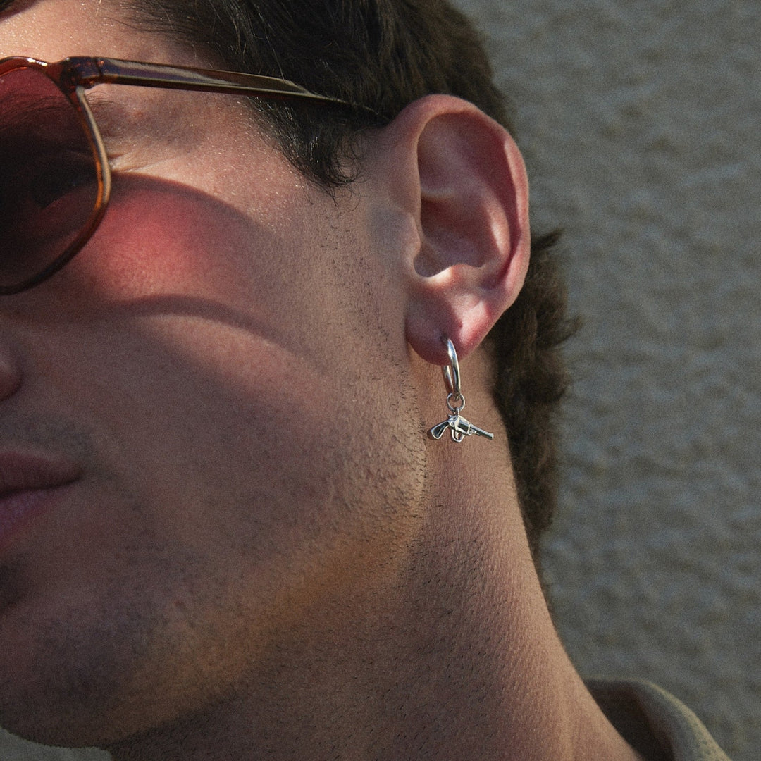 PIERCINGS ARO GUN N ROSES