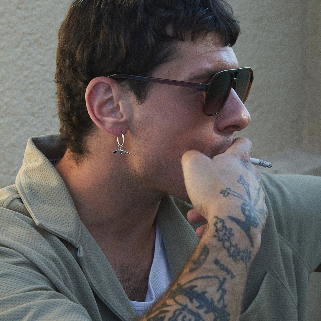 PIERCINGS ARO GUN N ROSES